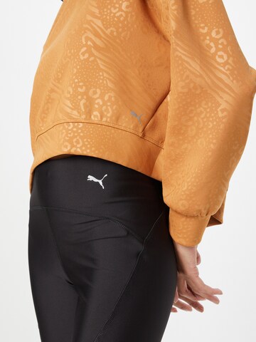 PUMA Sportief sweatshirt 'Fashion Luxe Embossed' in Bruin