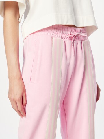 ADIDAS ORIGINALS Tapered Pants 'Adicolor 70S 3-Stripes' in Pink