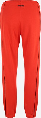 Effilé Pantalon Nike Sportswear en rouge