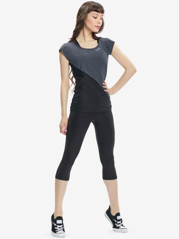 Winshape Skinny Spodnie sportowe 'HWL217C' w kolorze czarny