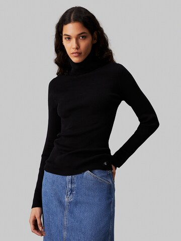 Pull-over Calvin Klein Jeans en noir : devant
