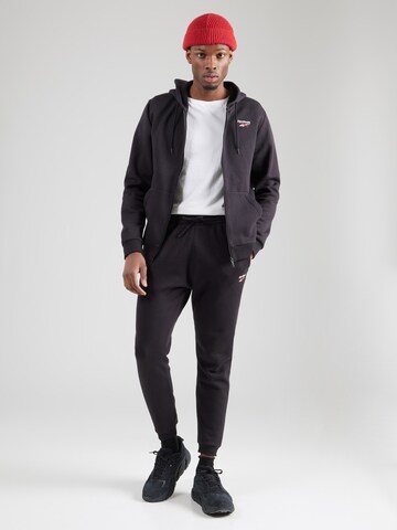 Tapered Pantaloni sport 'Identity' de la Reebok pe negru
