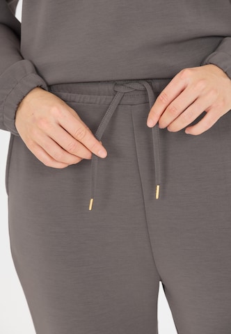 Athlecia Regular Sweatpants 'Jacey' in Braun