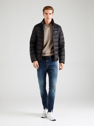Tommy Jeans Zimska jakna | črna barva