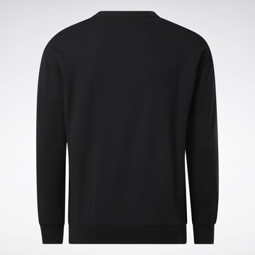 Reebok - Sudadera en negro
