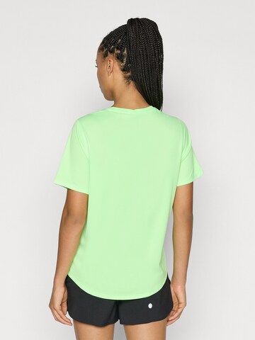 ASICS Функциональная футболка 'CORE' в Зеленый
