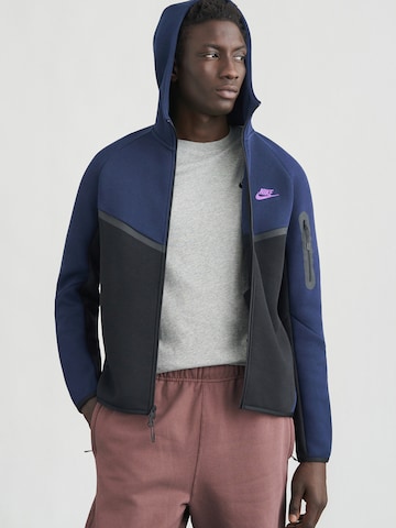 Veste de survêtement 'TCH FLC' Nike Sportswear en noir