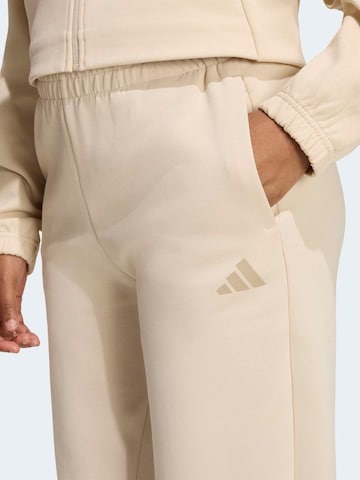 Effilé Pantalon de sport 'FI' ADIDAS SPORTSWEAR en beige