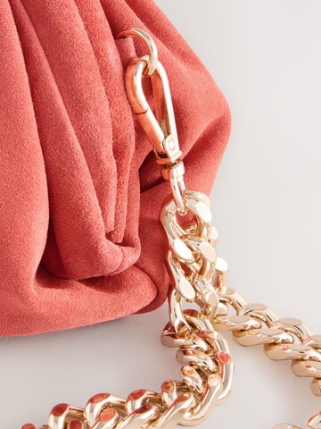 Pochette di Next in arancione
