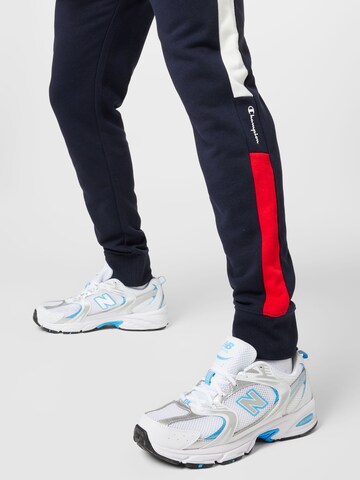 Champion Authentic Athletic Apparel Tracksuit in Blue