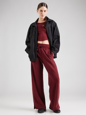 Nike Sportswear Široký strih Nohavice 'PHNX' - Červená