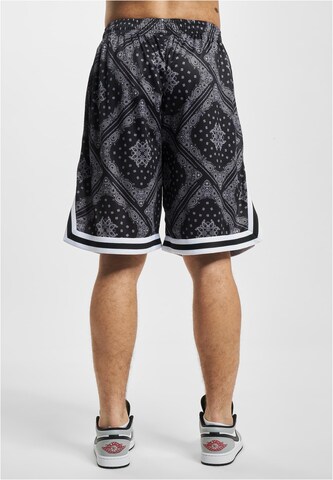 Karl Kani Loose fit Trousers in Black