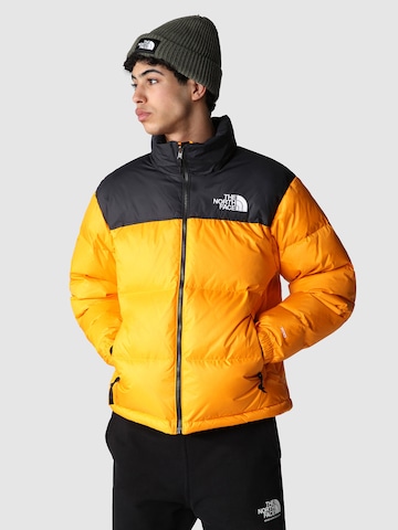 THE NORTH FACE Regular fit Winter Jacket 'M 1996 Retro Nuptse' in Orange: front