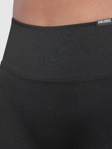 Skinny Pantalon de sport Smilodox en noir