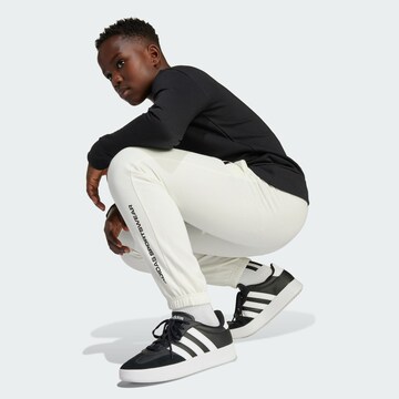 ADIDAS SPORTSWEAR Tapered Sports trousers in White