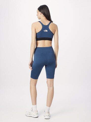 Skinny Pantalon de sport THE NORTH FACE en bleu