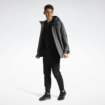 Veste mi-saison Reebok en noir