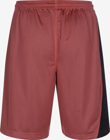 Regular Pantalon de sport 'Curry Splash 9' UNDER ARMOUR en rouge