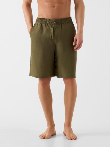 GUESS Loosefit Shorts in Grün: Vorderseite