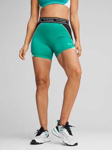 PUMASkinny Sportske hlače 'Train Strong 5' - zelena boja: prednji dio