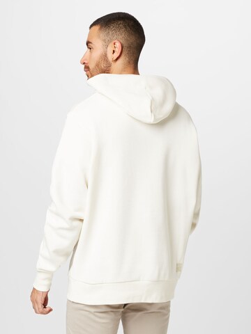Felpa di Champion Authentic Athletic Apparel in beige