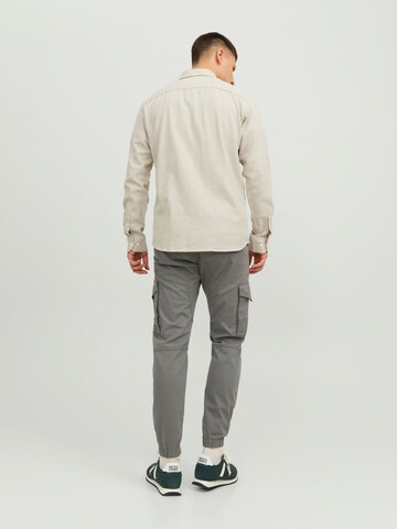 Effilé Pantalon cargo 'Paul Flake' JACK & JONES en gris