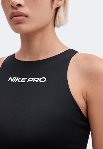 NIKE Μπουστάκι Αθλητικό σουτιέν σε μαύρο: μπροστά