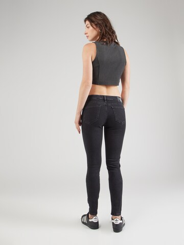 Calvin Klein Jeans Kitsas Teksapüksid 'MID RISE SKINNY', värv must