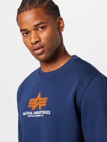 ALPHA INDUSTRIES Sweatshirt in Blauw