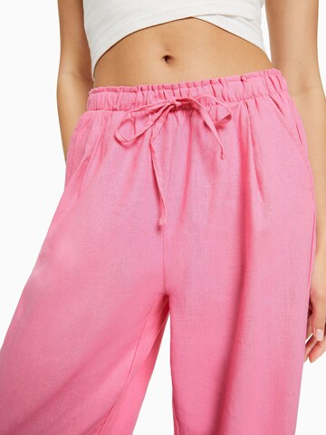 Bershka Zvonové kalhoty Kalhoty – pink