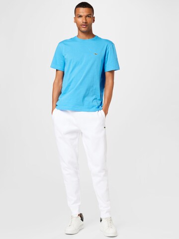 LACOSTE Slim fit Trousers in White