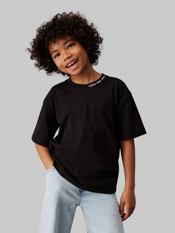 Calvin Klein Jeans Koszulka w kolorze czarny: przód