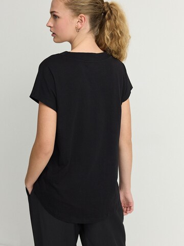 T-shirt Next en noir