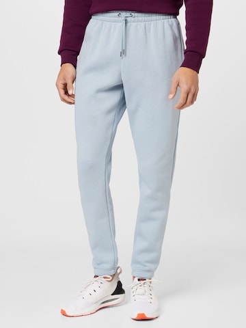 Effilé Pantalon de sport 'Essential' UNDER ARMOUR en bleu : devant