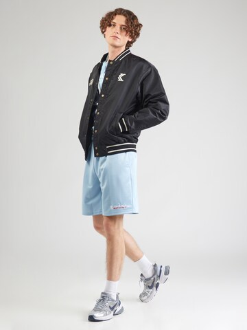 Karl Kani Regular Trousers in Blue
