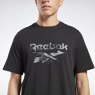Reebok Toiminnallinen paita ' Identity Modern Camo ' värissä musta