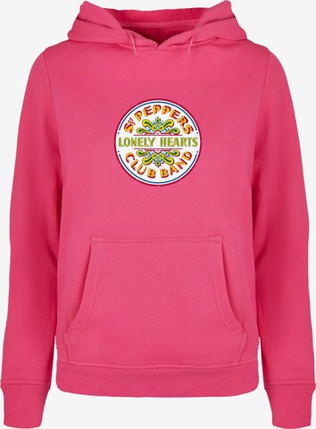 Merchcode Sweatshirt 'Beatles - St Peppers Lonely Hearts' in Roze: voorkant