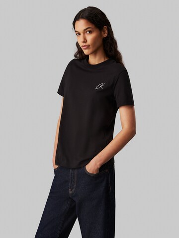 T-shirt Calvin Klein Jeans en noir : devant