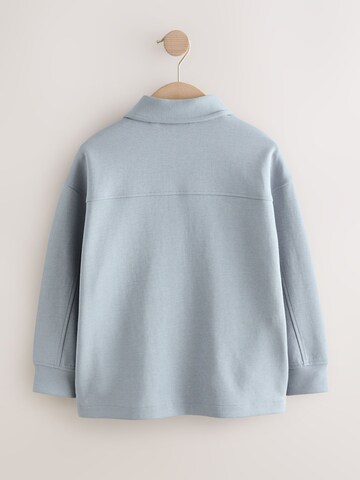 NextPrijelazna jakna - plava boja