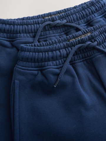 Next Tapered Byxa i blå