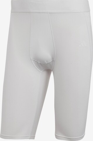 ADIDAS PERFORMANCE Skinny Workout Pants in White: front