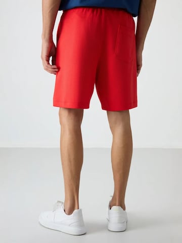 Regular Pantalon Tommy Life en rouge