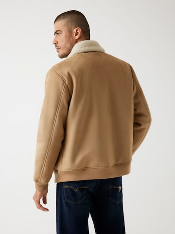 GUESS Between-Season Jacket in Brown