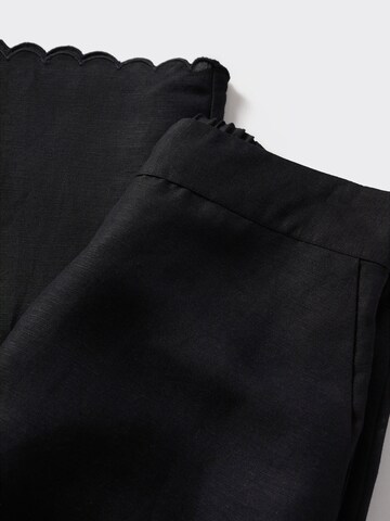 Wide leg Pantaloni 'ALMOND' di MANGO in nero