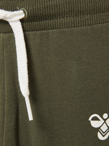 Effilé Pantalon de sport 'Apple' Hummel en vert