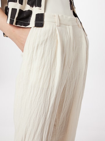 Monki Loose fit Pleat-Front Pants in White