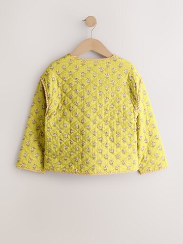 Next Přechodná bunda – žlutá