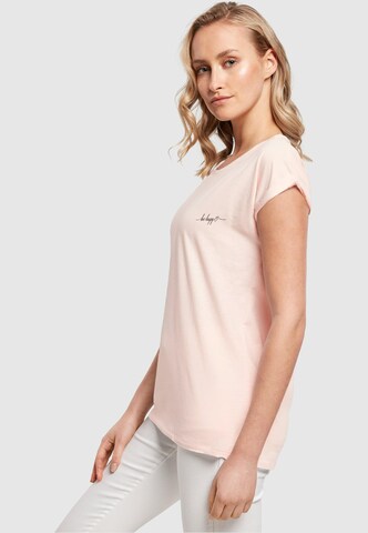 T-shirt 'Be Happy' Merchcode en rose