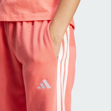 ADIDAS SPORTSWEAR Tapered Παντελόνι φόρμας 'Essentials' σε κόκκινο