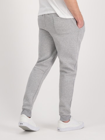 ALPHA INDUSTRIES Tapered Trousers in Grey